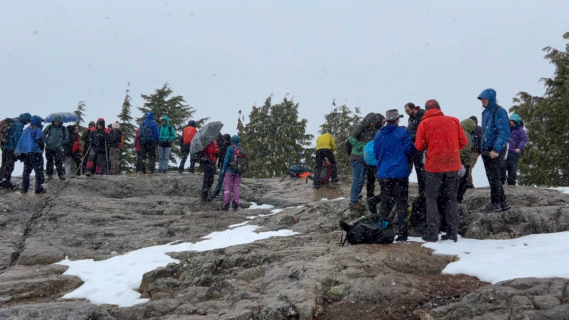 snowing on the mountain top